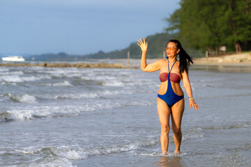 Woman body big enjoy with swimsuit at beach