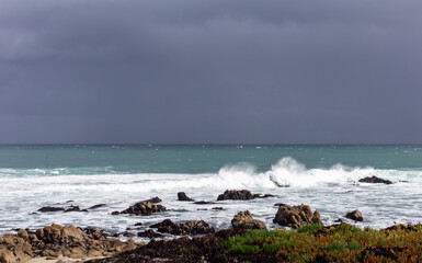 Waves on the Pacific Ocean shore in stormy weather