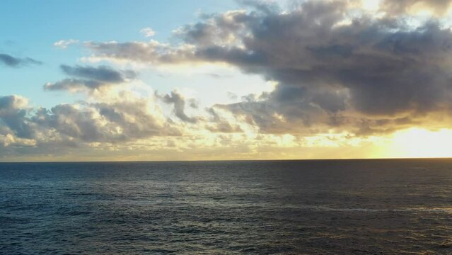 Aerial drone shot of a cloudy sunrise over the ocean near Bondi Austraia