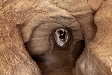 The underground  tunnel of copper ore miners who mined ore during the time of King Solomon in the national park Timna, near the city of Eilat, in southern Israel