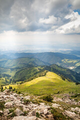 Fototapeta na wymiar Almaty summer mountains, view from Panorama peak. Copy space, vertical.