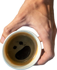 Isolate A hand holding a black coffee in a paper cup with an artistic smiley face