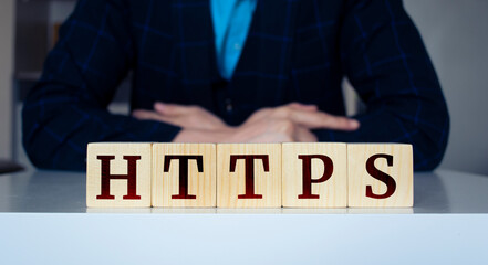 The word HTTPS written on wood cube.