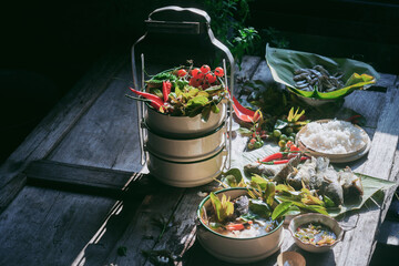 Striped snake-head fish Recipe with Cratoxylum formosum flower in Thailand.(Spicy Fish soup)