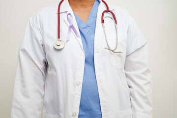 Asian woman doctor with purple ribbon, World Pancreatic Cancer day or World Alzheimer day.