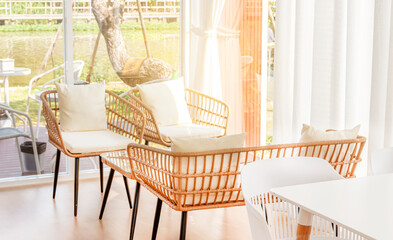Table and woven chair in a coffee shop
