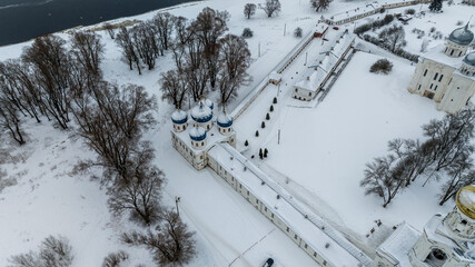 panoramic view from a drone on the ancient monastery of St. Yuriev in Veliky Novgorod on a winter day