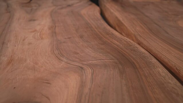 a wooden surface is slowly shown. slow motion video. Wood texture background. High quality Full HD video recording