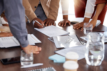 Hands, documents and contract with a business team signing paperwork in the office during a...