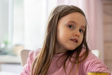 Children's emotions. Portrait of surprised pretty girl on natural background