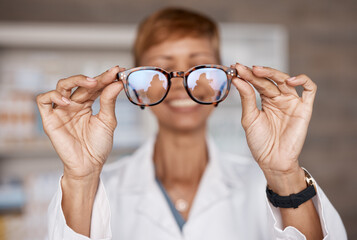 Optometry, hands and doctor with glasses in hospital or clinic for ophthalmology. Vision,...