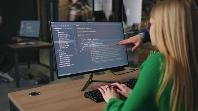 Female Data Scientist Works In Modern IT-Company, Using Computer For Creating Project