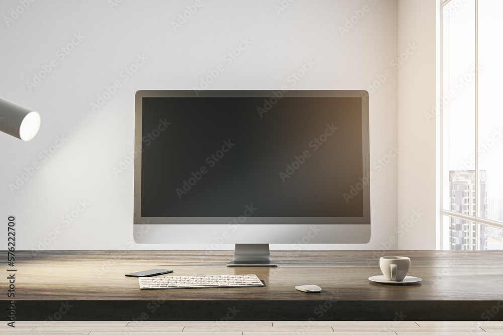Wall mural front view on blank dark modern computer monitor with place for your web site or web design on woode