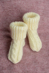 Small baby socks made of soft cotton yarn