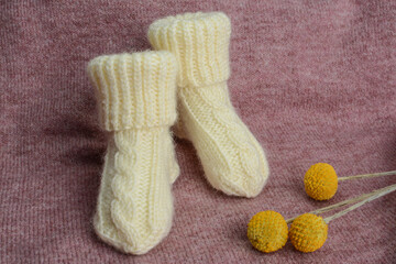 Small baby socks made of soft cotton yarn