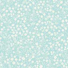 Vintage seamless tiny floral pattern. Turquoise background with small light yellow flowers. Design for wallpaper, clothing, packaging, fabric, cover, textiles