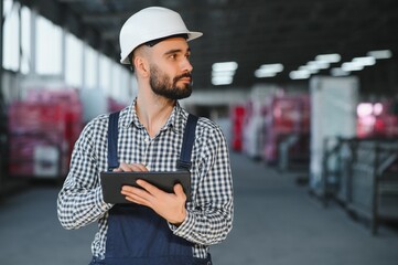 Warehouse worker. Guy in warehouse worker uniform.