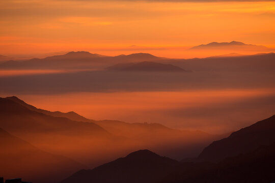 Foggy Mountain During Sunset In La Parva, Chile
