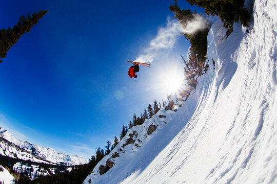 Extreme skier doing stunt in mid-air, Jackson, Wyoming