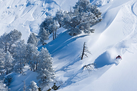 Aerial view of man skiing, Aran Valley, Spain
