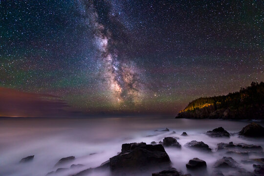 Milky Way over rocks and cliffs of Bold Coast