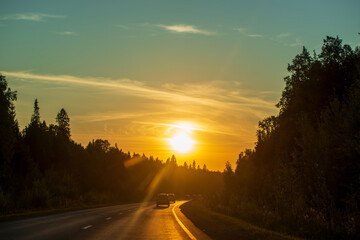 sunset on the highway on a summer evening