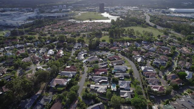 Suburban Houses On The Mudgeeraba Creek Near Robina Town Centre In Gold Coast, Queensland. wide aerial