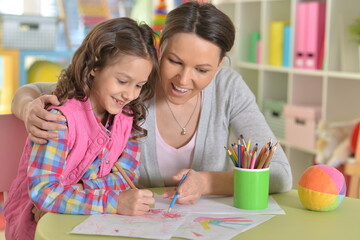 Fototapeta premium mother with daughter drawing