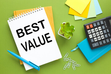 BEST VALUE bright green background. a lot of multi-colored stationery and a notepad with text. calculator