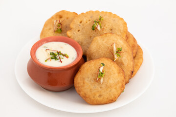 Traditional Indian Malpua, Pua Or Pooa Served With Lachhedar Malai Rabri Also Called Khurchan Rabdi, Lachha Rabidi Is Widely Enjoyed On Festival Like Holi, Diwali