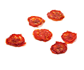 Dried  red tomatoes on white background