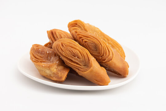 Indian Madatha Thumb Khaja Also Called Gottam Kaja, Badusha, Chirote, Kakinada Kaaja Is Traditional Layered Sweet Puff Pastry Famous In Andhra, Bengal, Gujrat, Bihar, Agra, Odisha, Orrisa In India