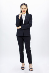 Portrait isolated cutout studio full body shot of Millennial Asian professional successful female businesswoman lawyer ceo in formal business suit holding hands crossed arms on white background