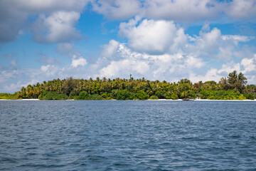 green tropical island in the sea