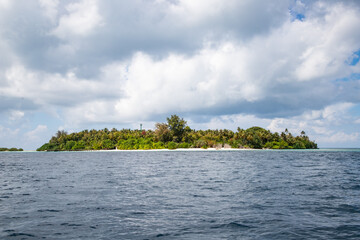 green tropical island in the sea