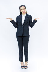 Portrait isolated cutout studio full body shot of Millennial Asian professional successful female businesswoman lawyer ceo in formal business suit holding hands crossed arms on white background