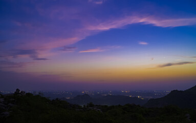 Obraz premium Beautiful Sunset from Hill top, Barabar, BharatThe Barabar Hill Caves are the oldest surviving rock-cut caves in India, dating from the Maurya Empire, some with Ashokan inscriptions.