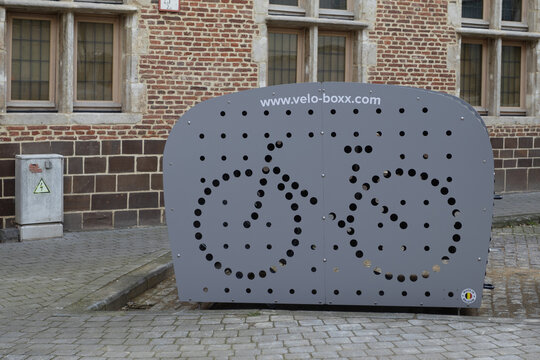 DIEST, BELGIUM, 25 FEBRUARY 2023: A Velo-Boxx bicycle storage hangar on the street in Diest. Velo Boxx is a Belgian company offering safe bicycle storage solutions for the urban environment.