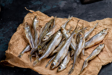 Salted dried capelin fish. Fish appetizer for beer
