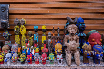 Typical and colorful African puppets in a shop in a souk in Marrakech.