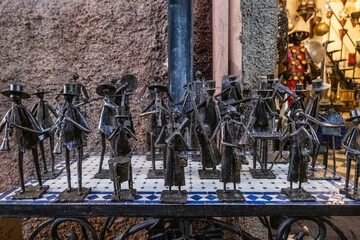 Miniatures of musicians made of metal in a shop in a souk in marrakech. 