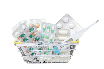 Tablets in a blister pack in a mini basket on a white background. The concept of health and...