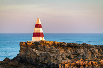 The iconic Robe Obelisk at sunrise viewed towards the ocean. A timeless monument that stands the...