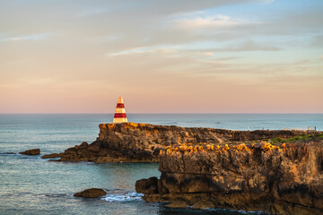 The iconic Robe Obelisk at sunrise viewed towards the ocean. A timeless monument that stands the...