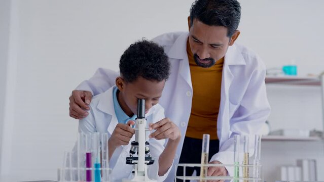4K, Close-up schoolgirl's face, under microscope, In science class, where teacher taught closely, In order able use in real-life chemistry experiments in science class, Students excited expressions.