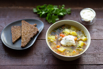 Soup with sour cream in a bowl