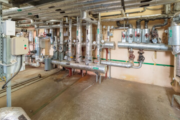 Industrial switching of heating pipes in the basement with pressure gauges on the pipes. overall plan