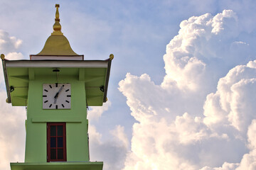 clock tower and big cloud Time concept of objects and nature