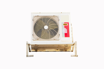 Old Air conditioner compressor source heat pumps on the install wall outdoor on roof top of building for cooling or on tiled roof. For cooling for the office. gray wooden wall as background.	