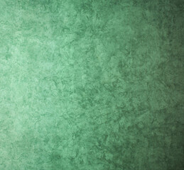 Fondo abstracto con detalle y suavizado de luz sobre tonos verdes